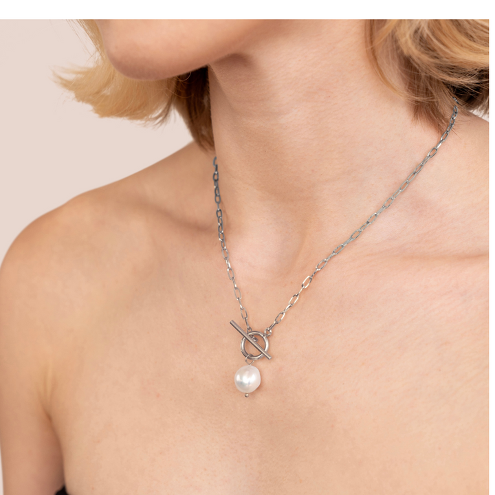 Eva’s Radiant Pearl Glow Charm