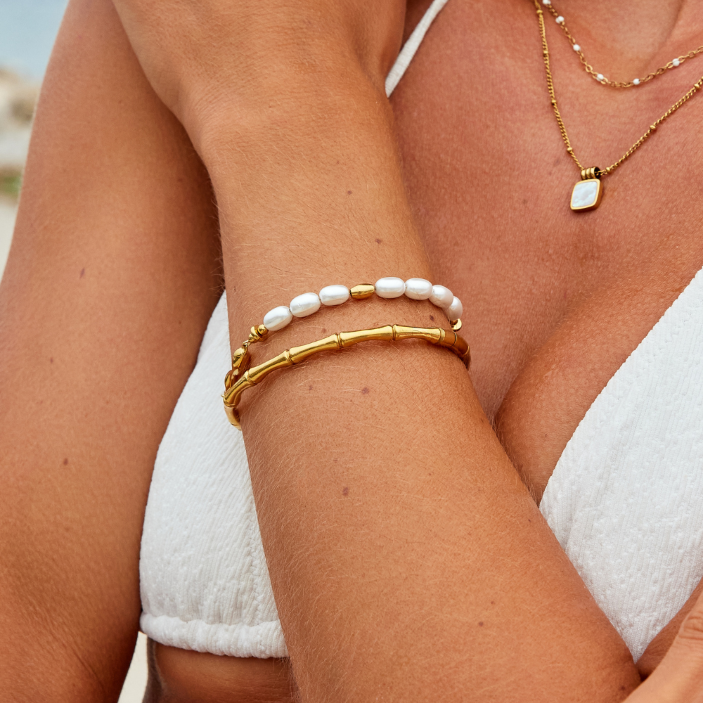 Radiant Ara Charm Bracelet
