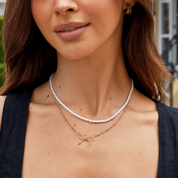 Anika’s Bow Elegance: Timeless Charm Accessory