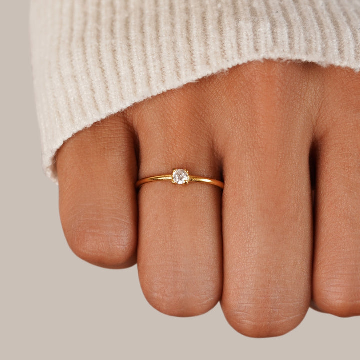 April’s Radiance: Timeless Elegance Ring