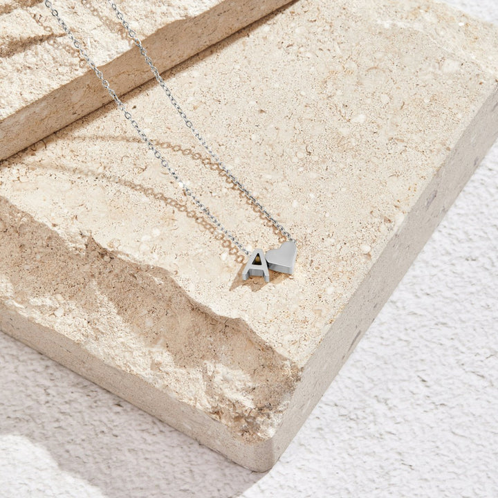Forever Yours: Timeless Letter Charm